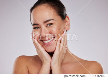 Woman, hand on face and skincare portrait in studio for beauty, dermatology and cosmetics glow. Aesthetic asian model person smile for makeup, skin and luxury facial self care for health and wellness Woman, hand on face and skincare portrait in studio for beauty, dermatology and cosmetics glow. Aesthetic asian model person smile for makeup, skin and luxury facial self care for health and wellness 118416902