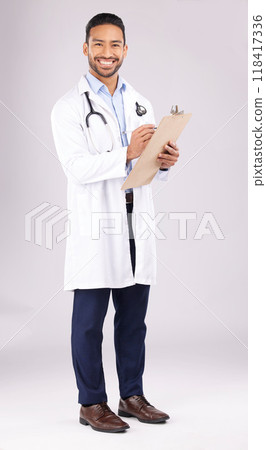 Happy asian man, portrait or doctor with clipboard in studio, planning notes or medical information. Healthcare worker smile for report of insurance checklist, documents or script on white background Happy asian man, portrait or doctor with clipboard in studio, planning notes or medical information. Healthcare worker smile for report of insurance checklist, documents or script on white background 118417336