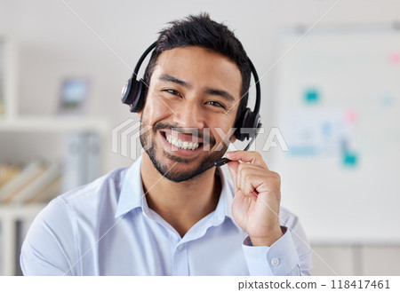 Portrait, call center and Asian man smile for telemarketing, customer service or technical support. Face, contact us and sales agent, crm consultant and person from Singapore working at help desk. 118417461
