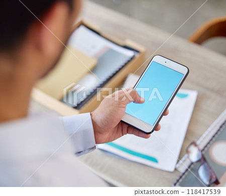 Business man hand, phone screen mockup and male person in a office with typing and networking at company. Text, social media app and professional worker with online communication and mobile message Business man hand, phone screen mockup and male person in a office with typing and networking at company. Text, social media app and professional worker with online communication and mobile message 118417539
