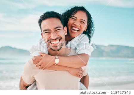 Love, portrait and piggyback with couple on beach for travel, summer and vacation together. Peace, smile and relax with man and woman hugging on date for seaside holiday, care and mockup space 118417543