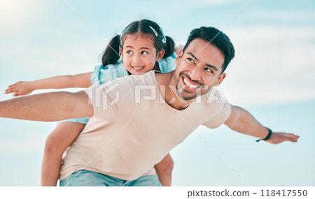 Airplane, smile and father with girl child at a beach with freedom, fun and bonding in nature. Flying, love and happy parent with kid at the ocean for travel, playing and piggyback games in Miami Airplane, smile and father with girl child at a beach with freedom, fun and bonding in nature. Flying, love and happy parent with kid at the ocean for travel, playing and piggyback games in Miami 118417550