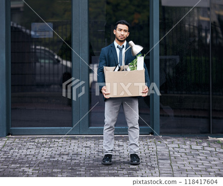 Depression, economy and box with a jobless business man walking outdoor in the city alone. Financial crisis, unemployment and fired with a young asian male employee looking sad in an urban town 118417604
