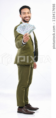 Investment, money and business man with cash on studio background for dollar savings, bonus and stock market. Finance success, winner and isolated male with bills for winning, bank profit and wealth 118417698