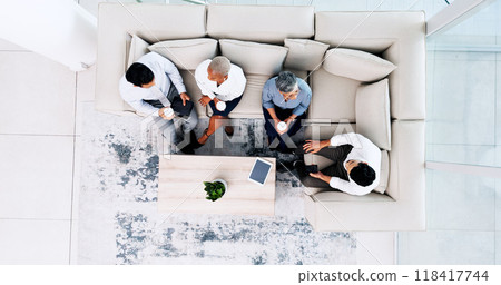 Business people, meeting and relax in lounge at office for lunch break, collaboration or team building above. Top view of employees in social discussion or collaboration on sofa together at workplace 118417744