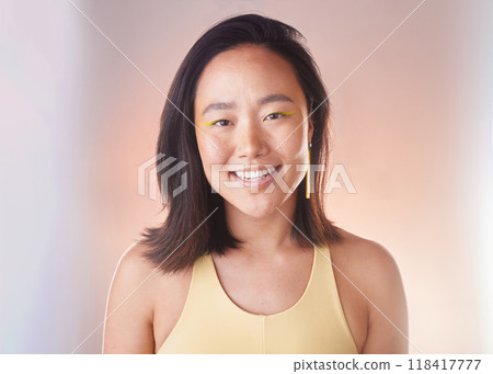 Portrait, fashion and skincare with a model asian woman in studio on a neon background for style. Face, beauty and freedom with an attractive young female standing alone for natural cosmetics 118417777