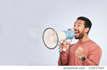 Megaphone, man and shout in studio space, white background and broadcast speech, announcement and mockup. Asian model, microphone and advertising sales, news and attention of deal, promotion or offer 118417887