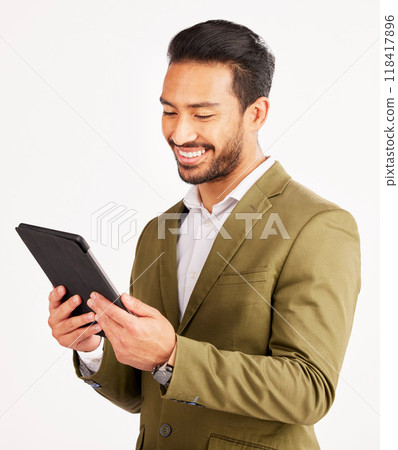Asian man, business and tablet in studio for online planning, stock market research and internet info on white background. Happy trader, digital technology and network connection for app on website 118417896
