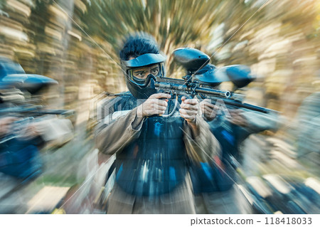 Paintball, action and team of friends ready for a battle and teamwork, collaboration and shooting game together. Serious, blur and army on a mission on the battlefield with guns for competition 118418033