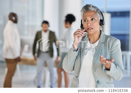 Senior woman, call center and talk with manager, confused and question at customer service job. Crm expert, group and leader with consultation by blurred background for help, faq and telemarketing Senior woman, call center and talk with manager, confused and question at customer service job. Crm expert, group and leader with consultation by blurred background for help, faq and telemarketing 118418336