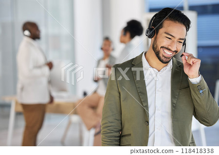 Agent man, call center and listening for consulting, teamwork or blurred background for contact us with smile. Happy crm consultant, customer service expert or tech support in modern office with team 118418338