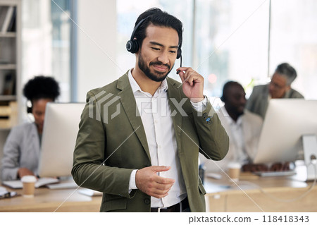 Call center, smile and consulting with man in office for customer support, telemarketing and advisory. Help desk, team leader and contact us with employee listening for communication, sales and crm 118418343