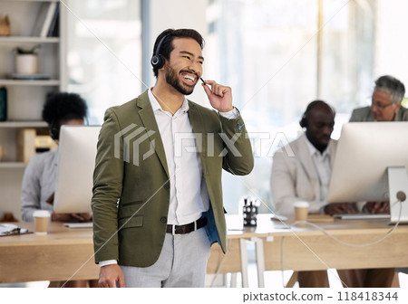 Call center, happy and consulting with man in office for customer support, telemarketing and advisory. Help desk, team leader and contact us with employee laughing for communication, sales and crm 118418344