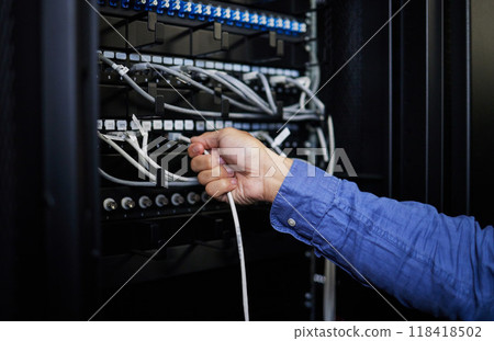 Engineer hands, server room and cable connection for software update or maintenance at night. Cybersecurity wires, cloud computing and male programmer or man check database network in data center. 118418502
