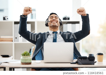 Business man, success and call center with celebration and work promotion email. Male worker, win and good news on a laptop in a office with motivation and typing at telemarketing job with smile Business man, success and call center with celebration and work promotion email. Male worker, win and good news on a laptop in a office with motivation and typing at telemarketing job with smile 118418561