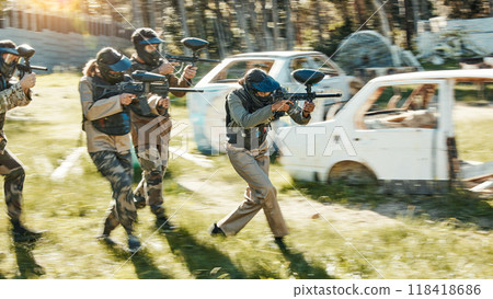 Teamwork, challenge and paintball with man in game for playground, war and gaming. Sports, mission and soldier with people shooting in battlefield arena for target, gun and warrior training 118418686