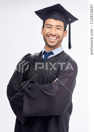 Student man, arms crossed and graduation in studio portrait, smile and success by white background. Young guy, happy university graduate and education achievement with pride, goals and celebration 118418687