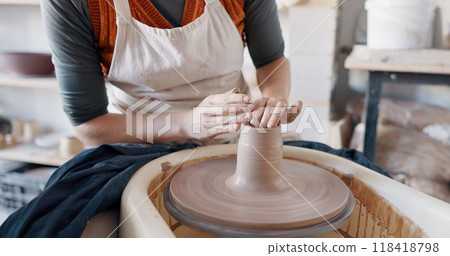 Pottery, hands and clay on wheel, art with container or bowl in studio, workshop or classroom. Artist, craft and hobby with creativity, unique mold, shape or handmade ceramic product design process 118418798
