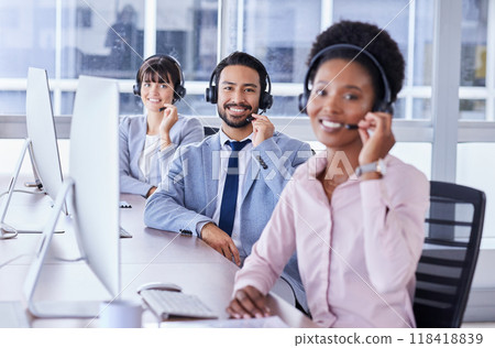 People, call center and portrait smile in contact us for telemarketing, customer support or service at office. Group of consultants smiling with headset in CRM agency for online advice, team or help People, call center and portrait smile in contact us for telemarketing, customer support or service at office. Group of consultants smiling with headset in CRM agency for online advice, team or help 118418839