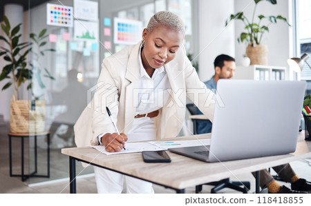 Business woman, writing and graphic designer with notes and information for project. Company, African female person and design strategy in a office with pen and document for website work at agency Business woman, writing and graphic designer with notes and information for project. Company, African female person and design strategy in a office with pen and document for website work at agency 118418855