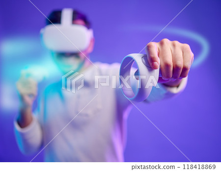 Virtual reality, metaverse and man fight on game with vr glasses for futuristic cyber 3d world. Gamer person with hand controller for ar app, digital experience and purple background overlay gaming 118418869