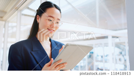 Happy asian business woman, tablet and office for planning online report, search information and app. Corporate employee scroll on digital technology, social networking and update data for innovation 118418913
