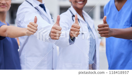 Doctor, thumbs up and medical teamwork with hands, smile or support for healthcare, wellness and mockup. Group, doctors and diversity with yes sign, team building or vision with solidarity for health 118418937