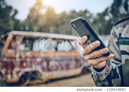 Smartphone in hand, communication and military person in paintball game outdoor, fitness and technology with mockup space. Chat, online and 5g network with social media, soldier in camouflage uniform Smartphone in hand, communication and military person in paintball game outdoor, fitness and technology with mockup space. Chat, online and 5g network with social media, soldier in camouflage uniform 118419001