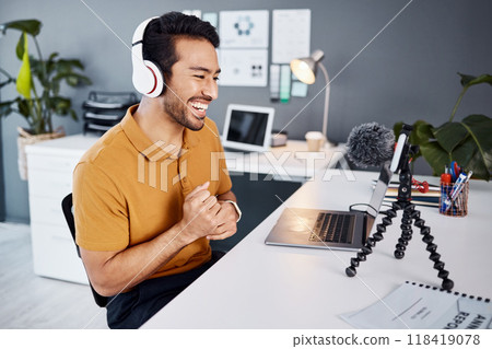 Podcast, smile and live stream with a man influencer recording broadcast content in his home office. Internet, freelance and subscription service with a male vlogger or creator working in his studio 118419078