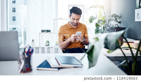 Man with smile, phone and typing in modern office, checking social media meme or email. Happiness, internet and mobile app, creative designer at start up agency reading web review or feedback online. 118419083