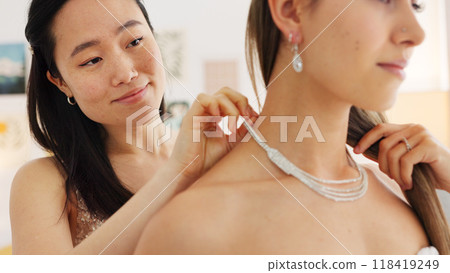 Wedding, necklace and bridesmaid helping bride get ready for marriage event, luxury and wealth. Women with support, trust and assistance, beauty and fashion with diamond, silver jewelry for ceremony Wedding, necklace and bridesmaid helping bride get ready for marriage event, luxury and wealth. Women with support, trust and assistance, beauty and fashion with diamond, silver jewelry for ceremony 118419249