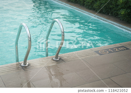 Swimming pool with handrail. 118421052