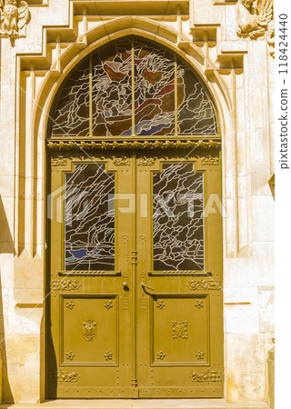 Ancient wooden ornate arch door . High quality photo 118424440