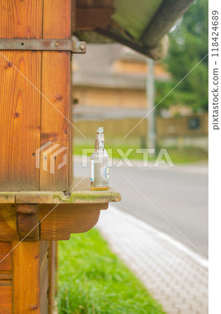 empty beer bottles left by the road . High quality photo empty beer bottles left by the road . High quality photo 118424689