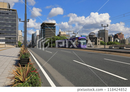 Sanfrecce-wrapped train at the Atomic Bomb Dome 118424852