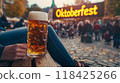 woman with beer. inscription "Oktoberfest" 118425266