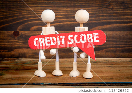 Credit Score concept. Speech bubble with word. Miniature human figures Credit Score concept. Speech bubble with word. Miniature human figures 118426832