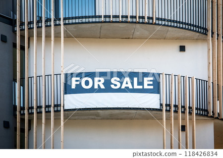 For sale sign outside a apartment building For sale sign outside a apartment building 118426834