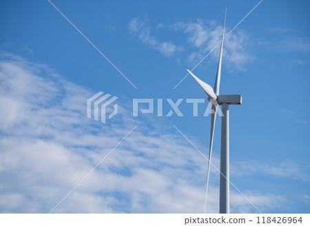 Wind turbines against blue sky, Wind energy. Wind power. Sustainable, renewable energy. Wind turbine generate electricity. Sustainable resources. Green technology for energy sustainability. Wind turbines against blue sky, Wind energy. Wind power. Sustainable, renewable energy. Wind turbine generate electricity. Sustainable resources. Green technology for energy sustainability. 118426964