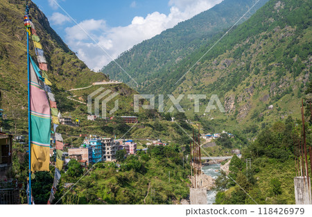 View of Syabrubesi village a beautiful resident village inside the Langtang National Park of Nepal. Syabrubesi lies at the base of a green hill on the way to Langtang Valley. 118426979