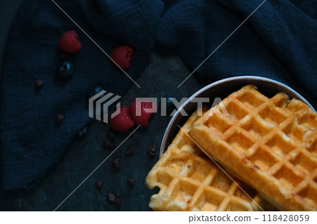 Belgian waffles on a dark background 118428059