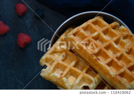 Belgian waffles on a dark background 118428062