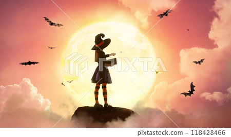 girl in witch costume at Halloween 118428466