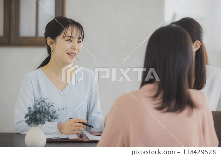 A woman having a meeting A woman having a meeting 118429528
