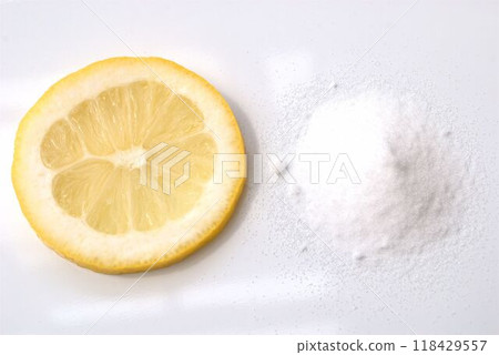 Lemon and citric acid on white background Lemon and citric acid on white background 118429557