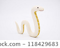 Snake ornament on a pink patterned background Year of the Snake New Year's material Snake ornament on a pink patterned background Year of the Snake New Year's material 118429683