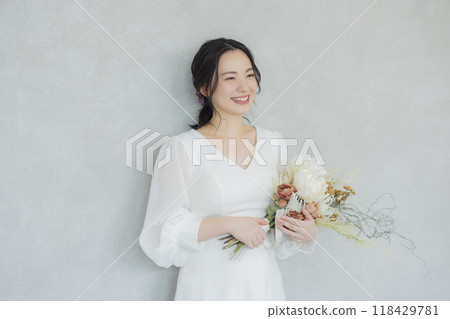 Young woman in a wedding dress Young woman in a wedding dress 118429781