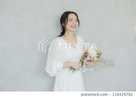 Young woman in a wedding dress 118429782