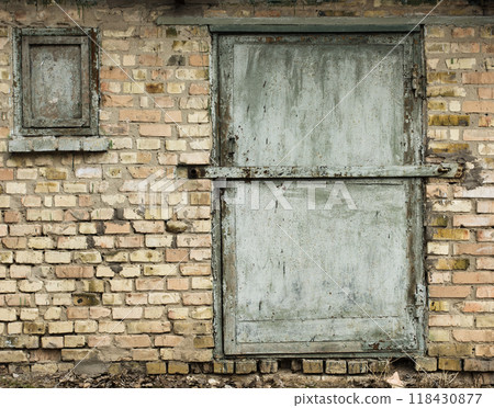 old metal warehouse door, hangar old metal warehouse door, hangar 118430877