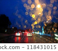 blurred lights of car on road 118431015